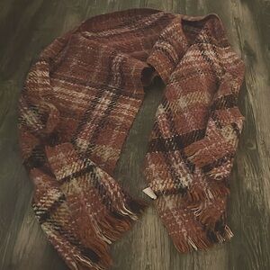 This is a plad coral scarf, it's very warm and cozy, and It's completely unused